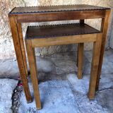 Pair of studded nesting tables and 1930