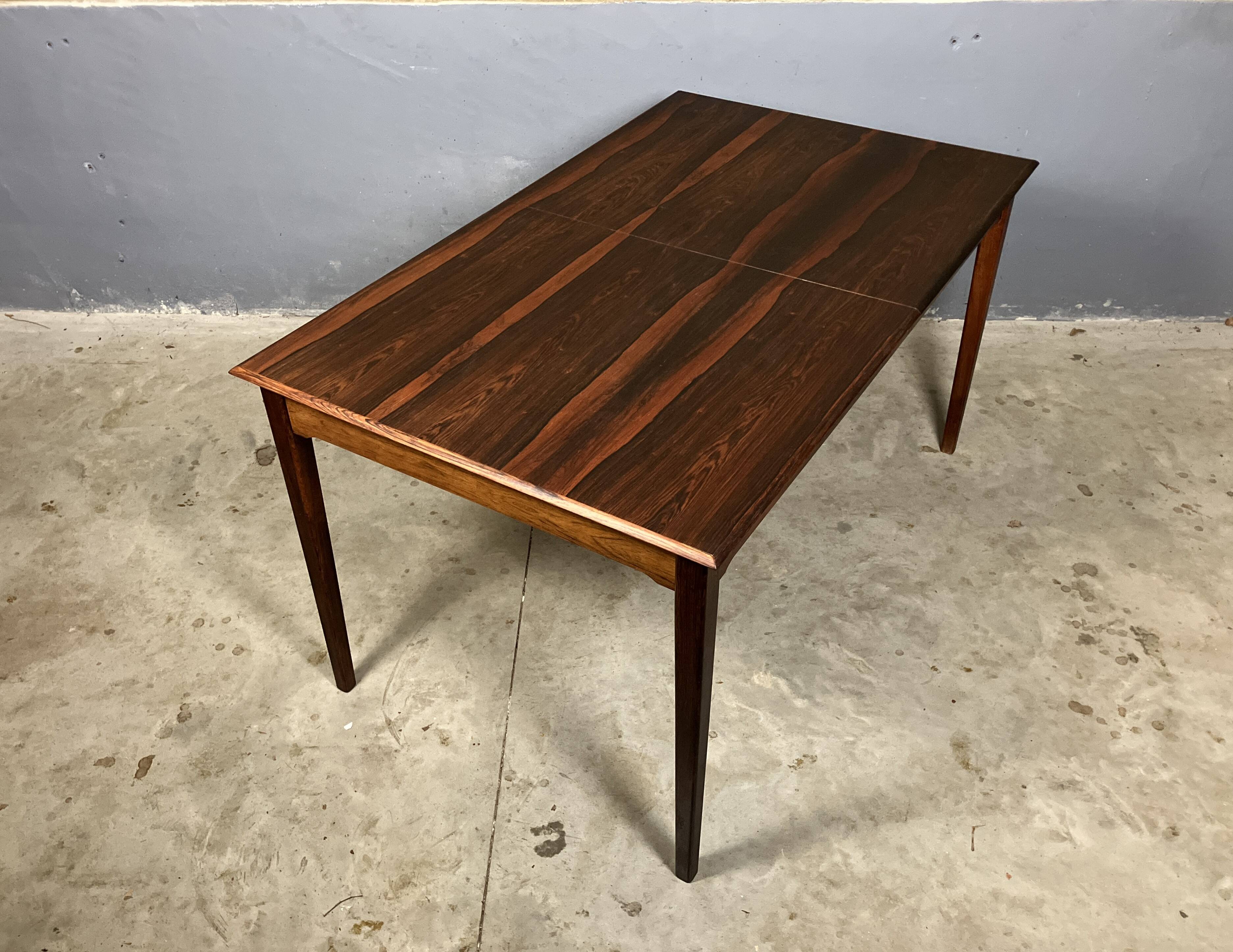 Mid-century rosewood extendable dining table