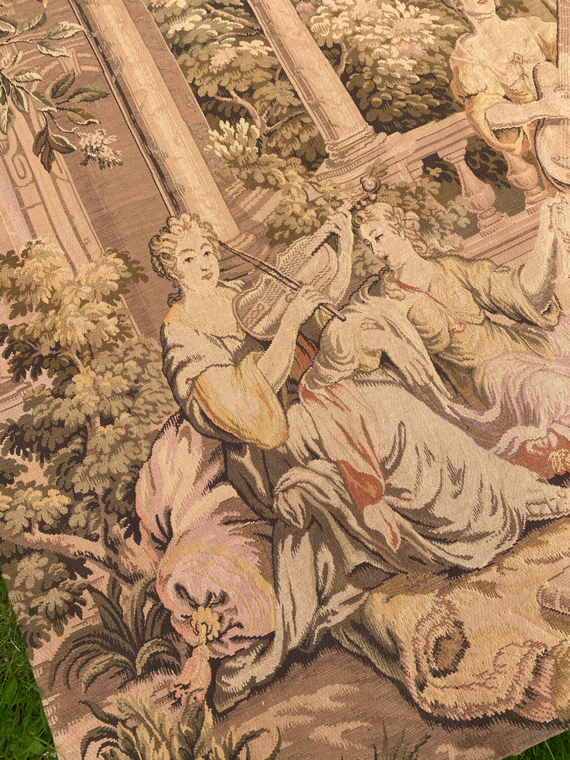 Large Aubusson-style wall tapestry with a musical scene.