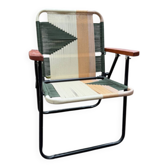 Folding armchair made of wood and rope, fabric
