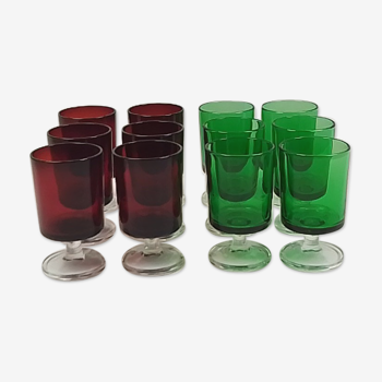 Set of 12 colored glasses on foot