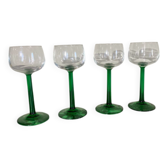 4 green stemmed glasses