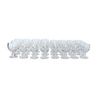 Twenty-four former crystal glasses