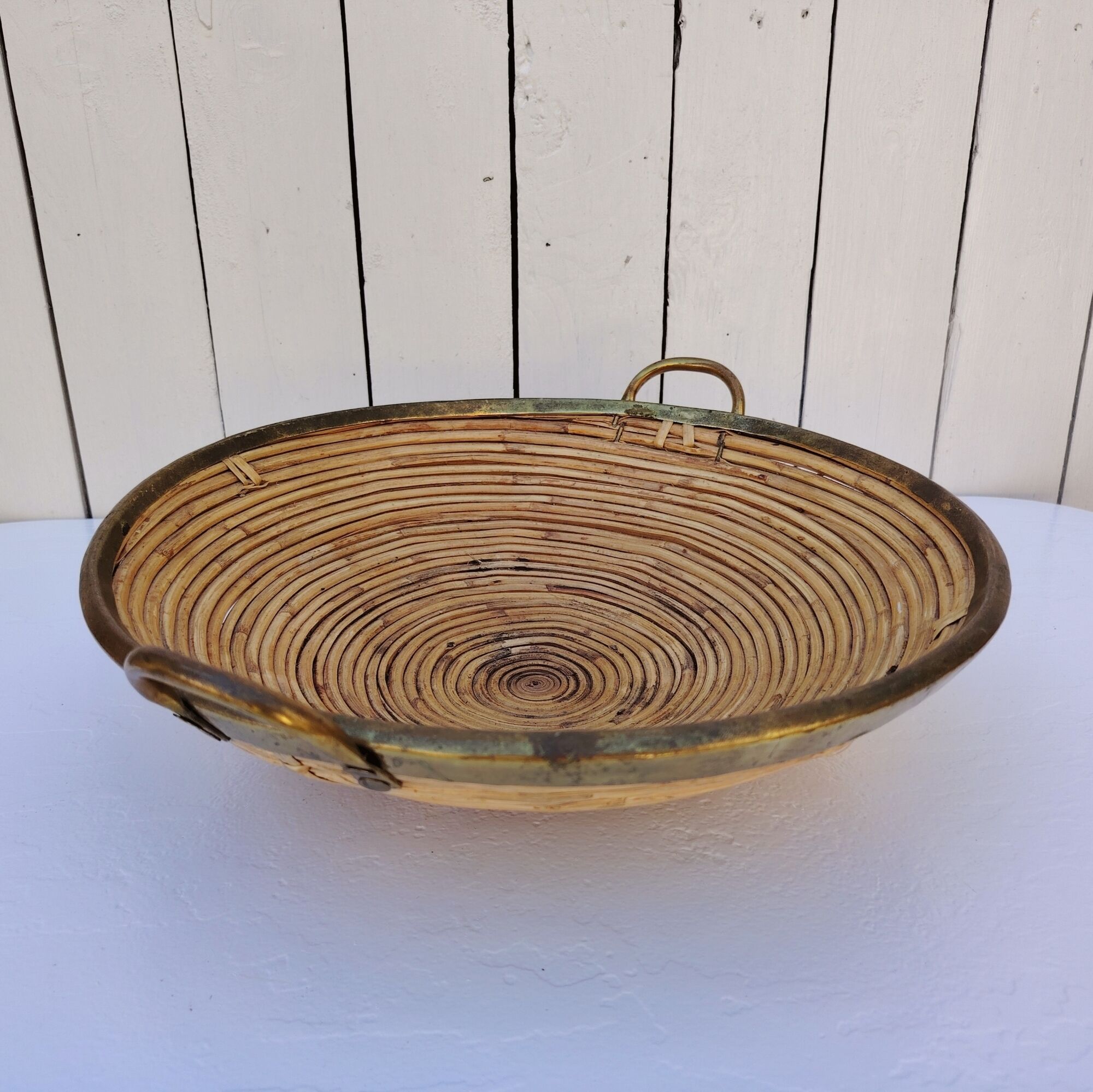 Rattan and brass basket in the style of Gabriella Crespi.