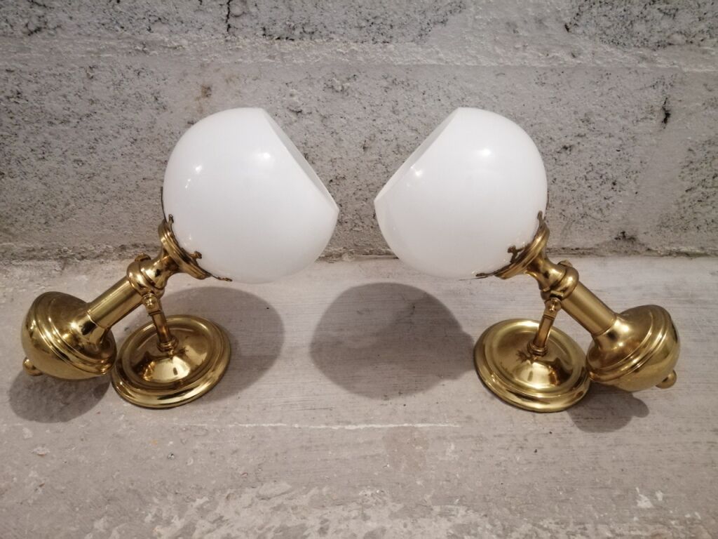 Pair of brass boat swivel appliques - opalin glass globe
