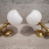 Pair of brass boat swivel appliques - opalin glass globe