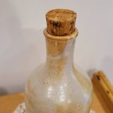Bouteille fleurie en grès émaillé