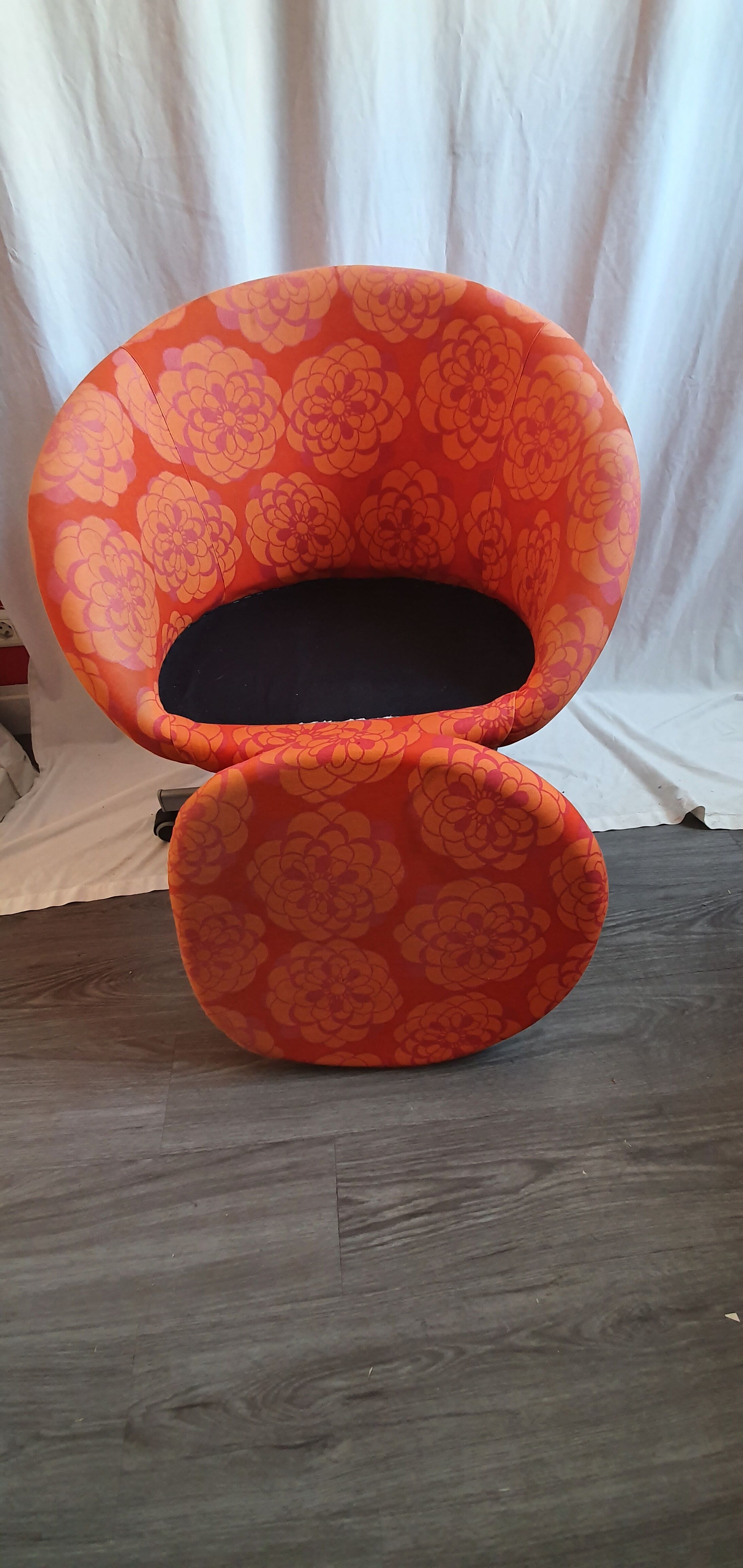 Seventies wheeled basket armchair