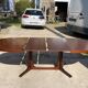 Baumann round oval extendable Scandinavian table in rosewood with 2 extensions.