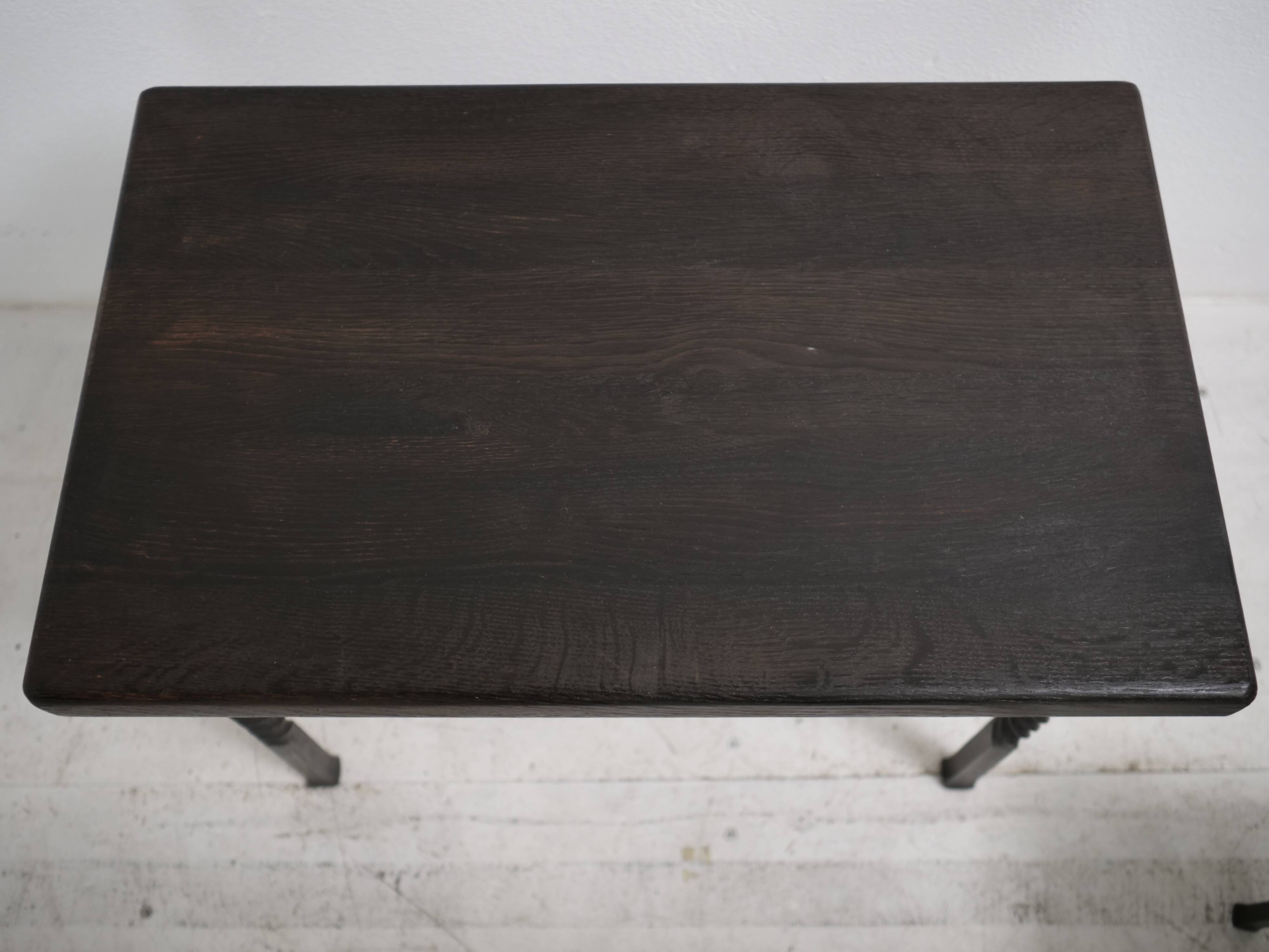 Brutalist nesting table in ebonized oak and wrought iron