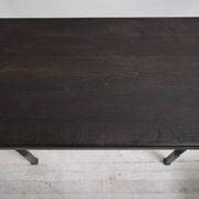 Brutalist nesting table in ebonized oak and wrought iron