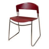 Red plastic-seat stacking chair with chrome frame by Paolo Favaretto for Assisa (Italy 1986) – vintage design
