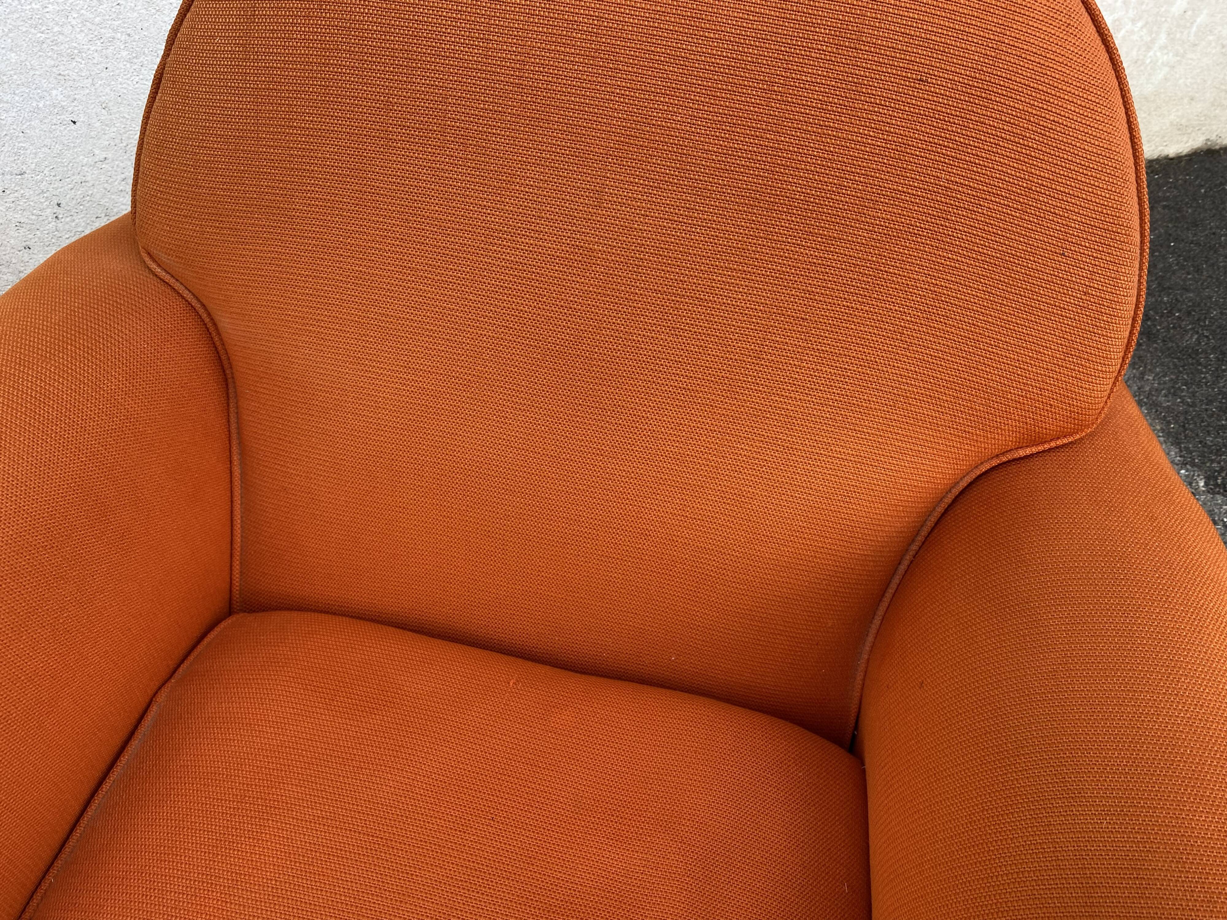 Pair of vintage orange club chairs
