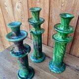 Trio of Tamegroute candlestick holders in enamelled ceramic.
