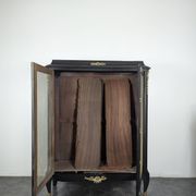 Bibliothèque vitrée en bois noirci époque Napoléon III