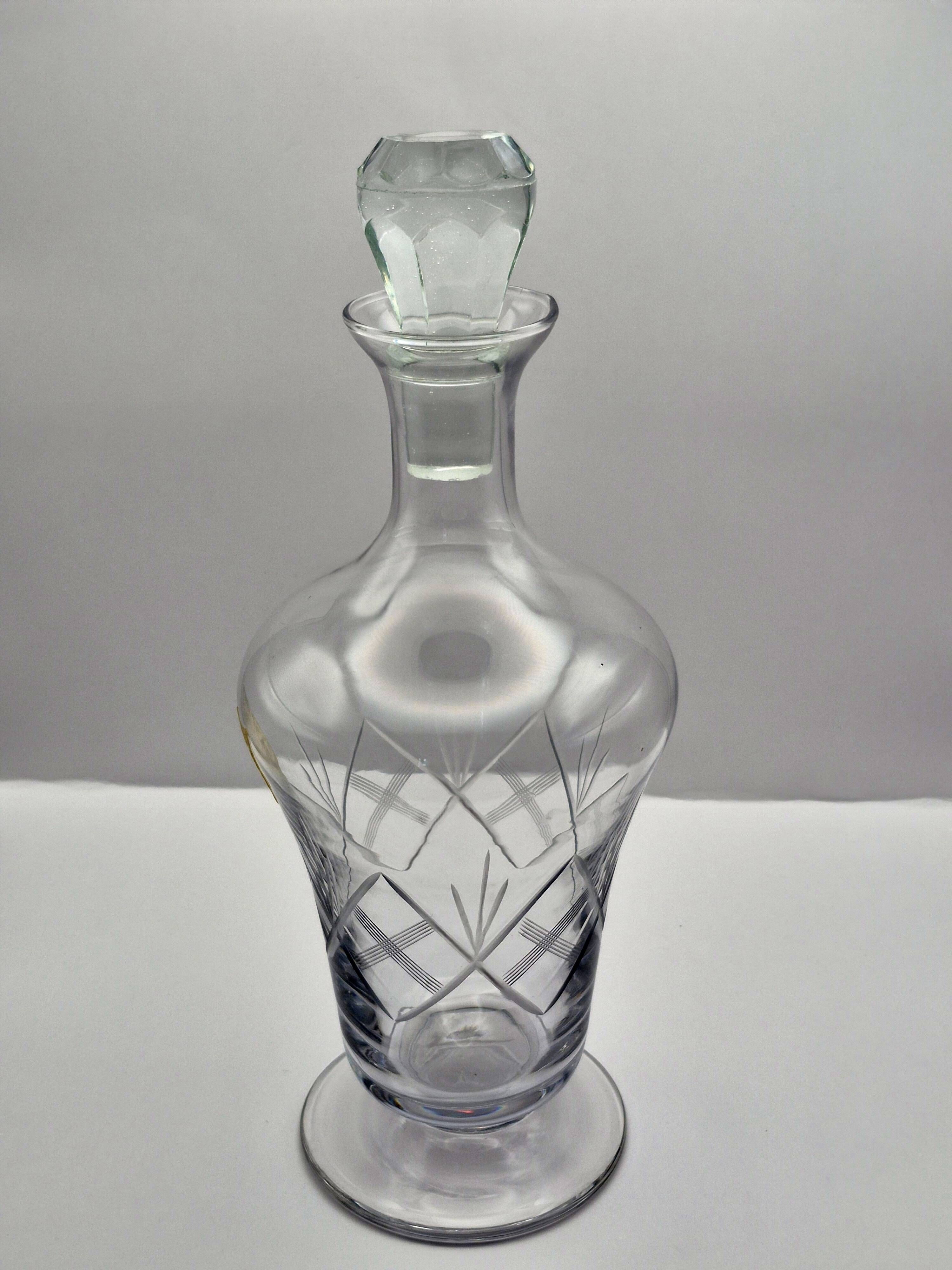 Crystal service from Fains, matching wine carafe and water jug.
