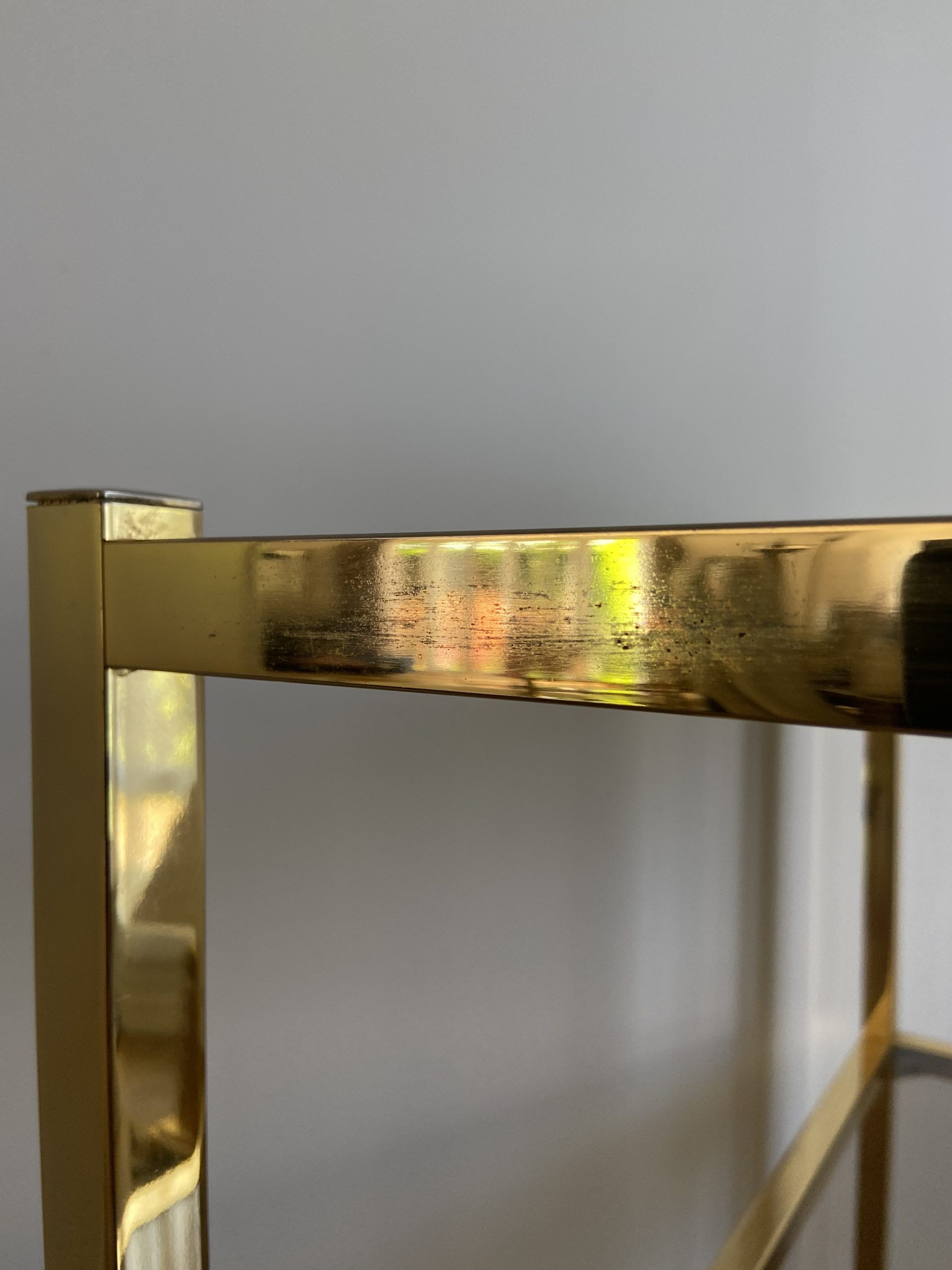 VINTAGE SHELF CONSOLE IN GOLD METAL AND SMOKED GLASS
