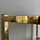 VINTAGE SHELF CONSOLE IN GOLD METAL AND SMOKED GLASS