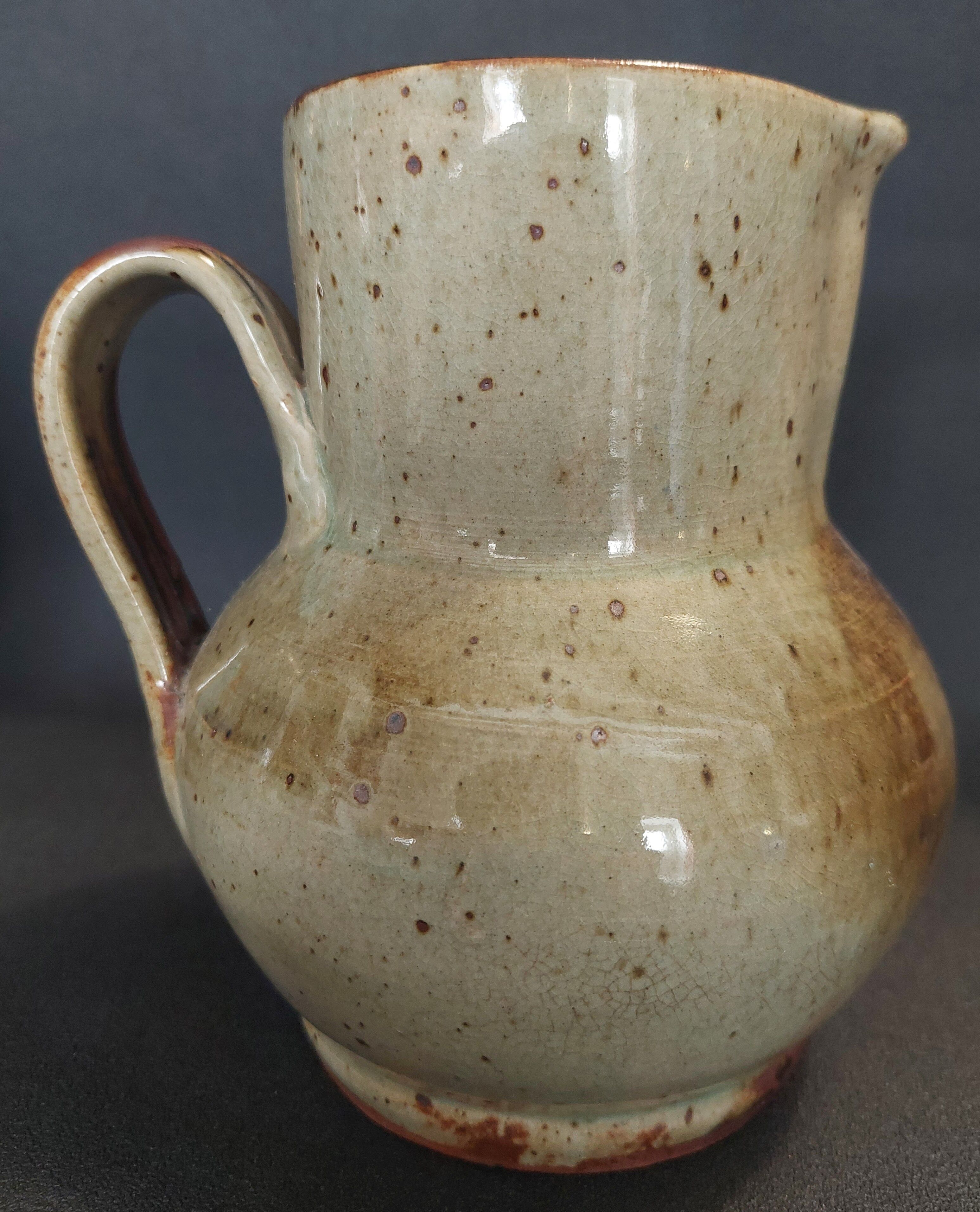 Glazed terracotta pitcher from the 20th century.