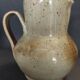 Glazed terracotta pitcher from the 20th century.