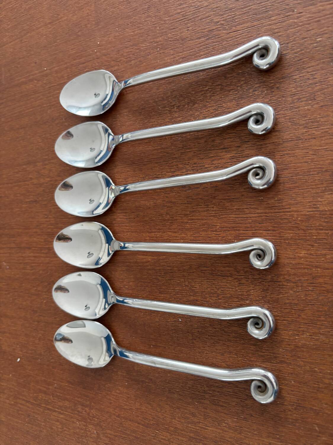 Vintage 24-piece stainless steel cutlery set with spiral handles