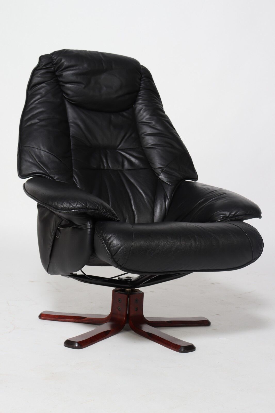 Pair of Danish black leather recliner swivel chairs by Hjort Knudsen