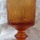 Amber stemmed glass