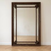Grand miroir ancien en bois sculpté