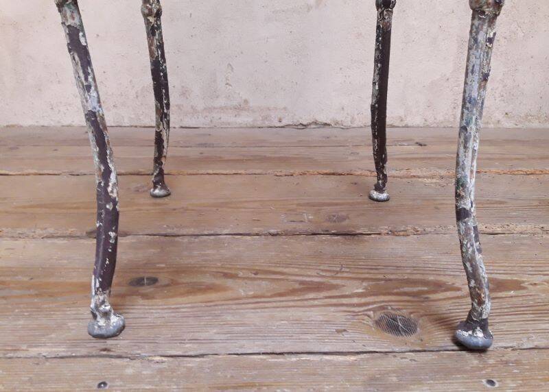 19th-century garden armchair in wrought iron