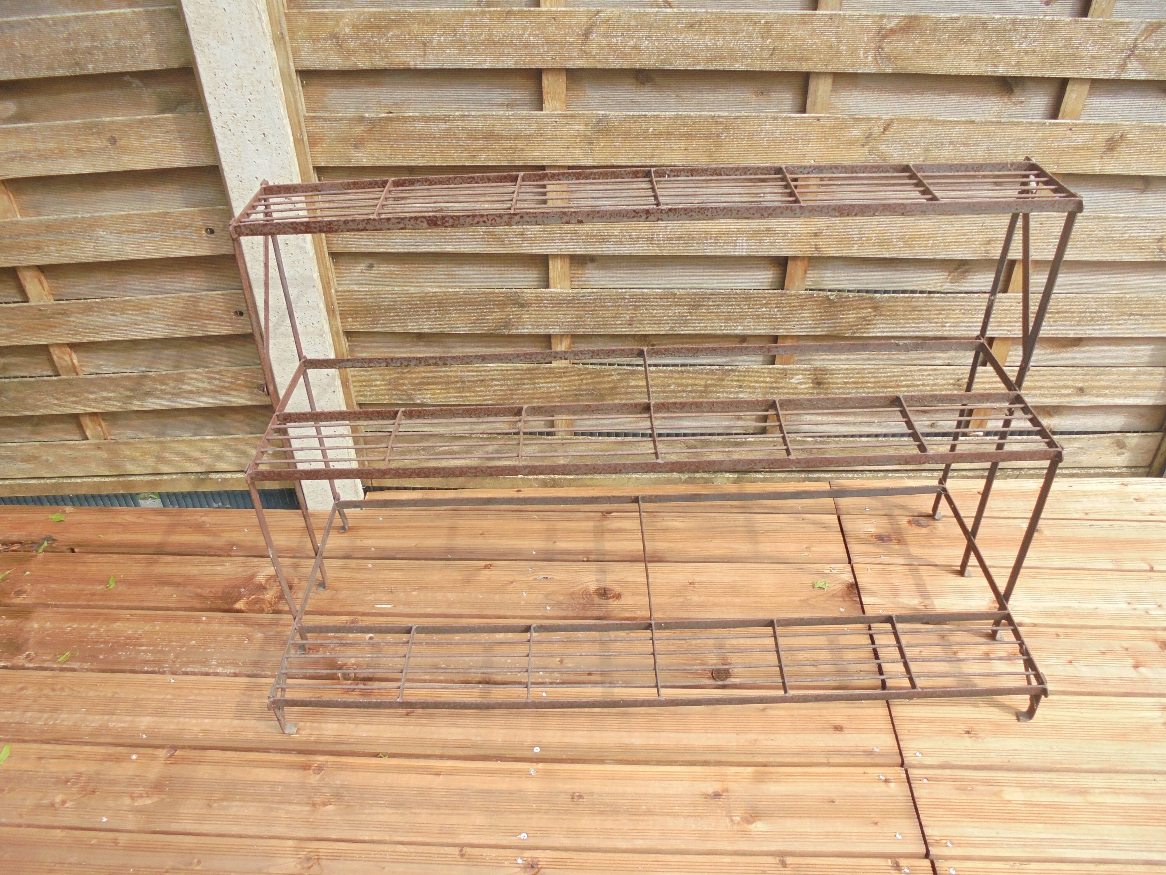 Old iron florist plant holder