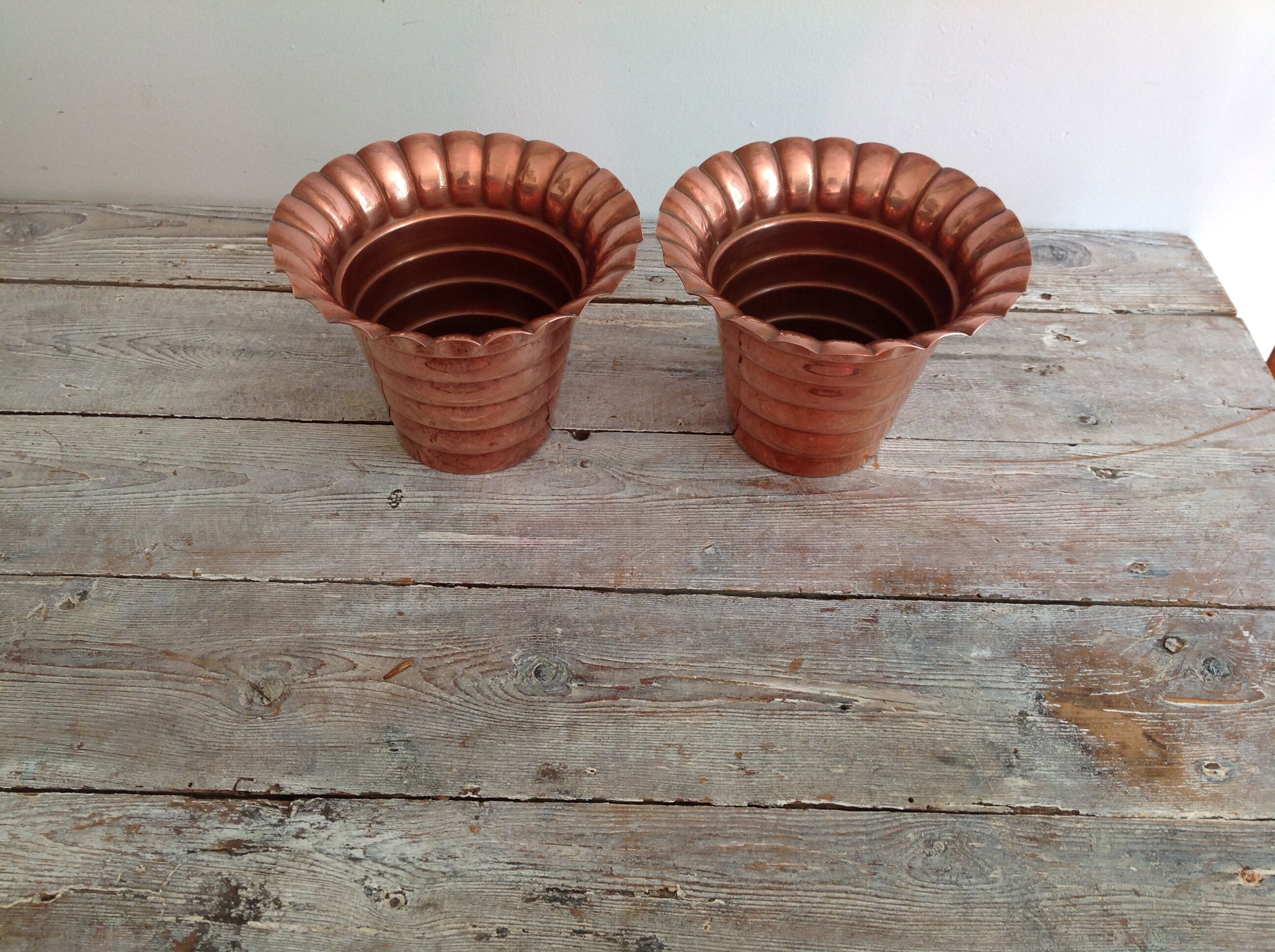 Duo of cache copper pots