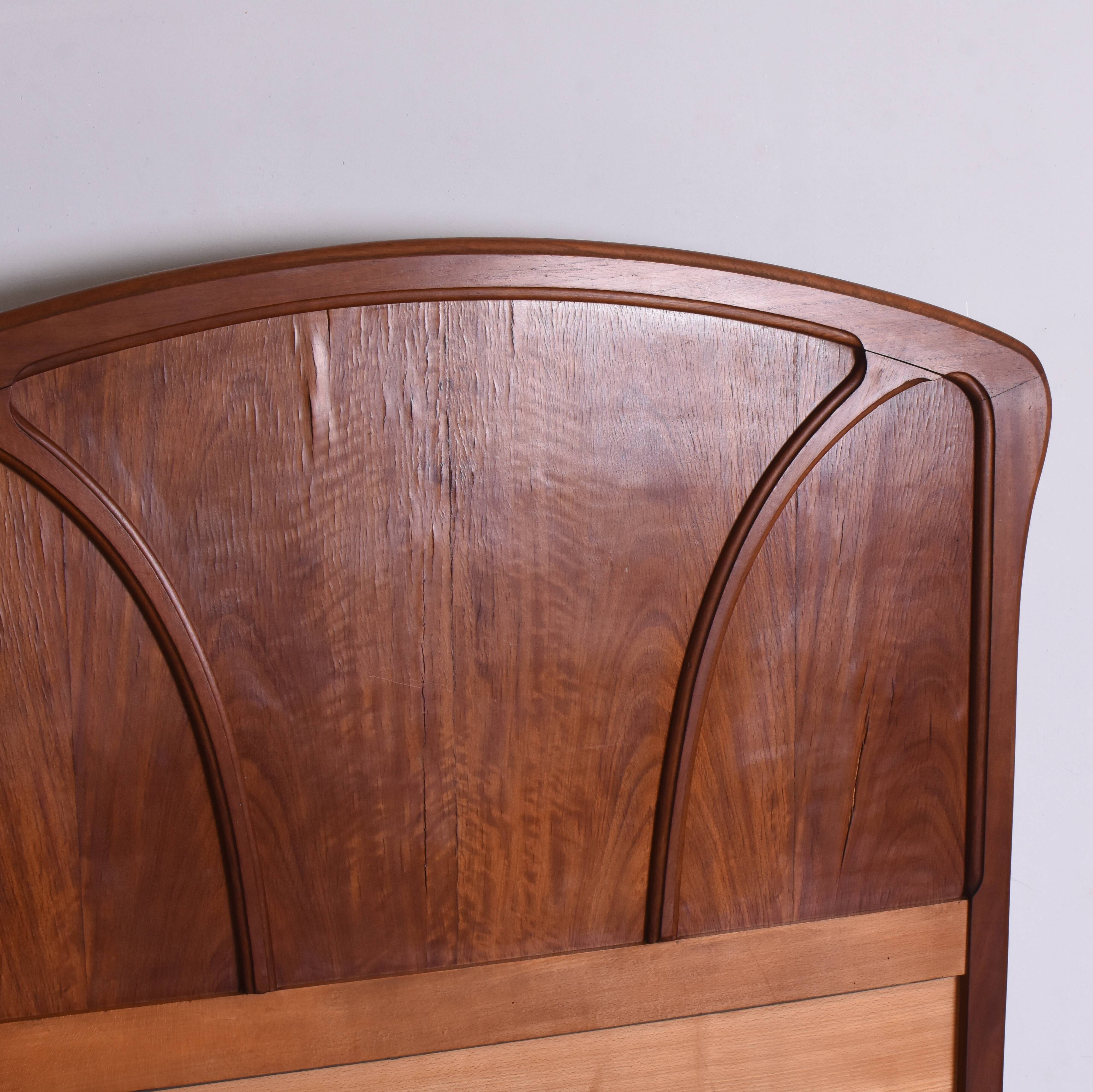 Wooden bed, early 20th century.
