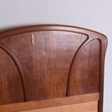 Wooden bed, early 20th century.