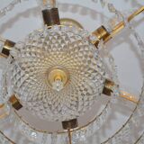 Old chandelier with tassels and brass
