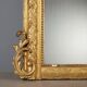 Antique eclectic style mirror in carved and gilded fir, Italy, 19th century.