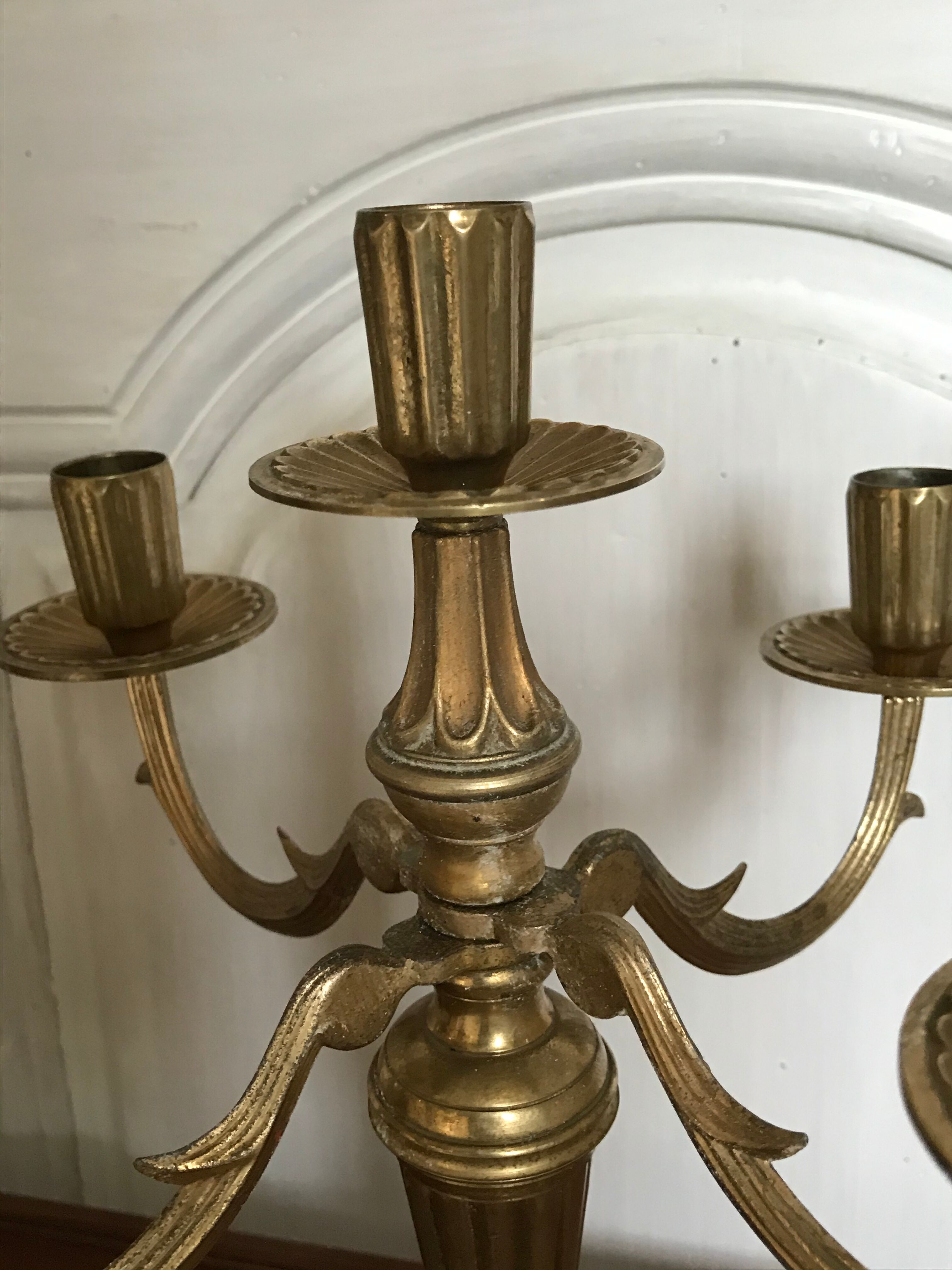 Pair of golden brass candlesticks