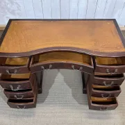 English desk with drawers from the 1950s in mahogany with a leather top.