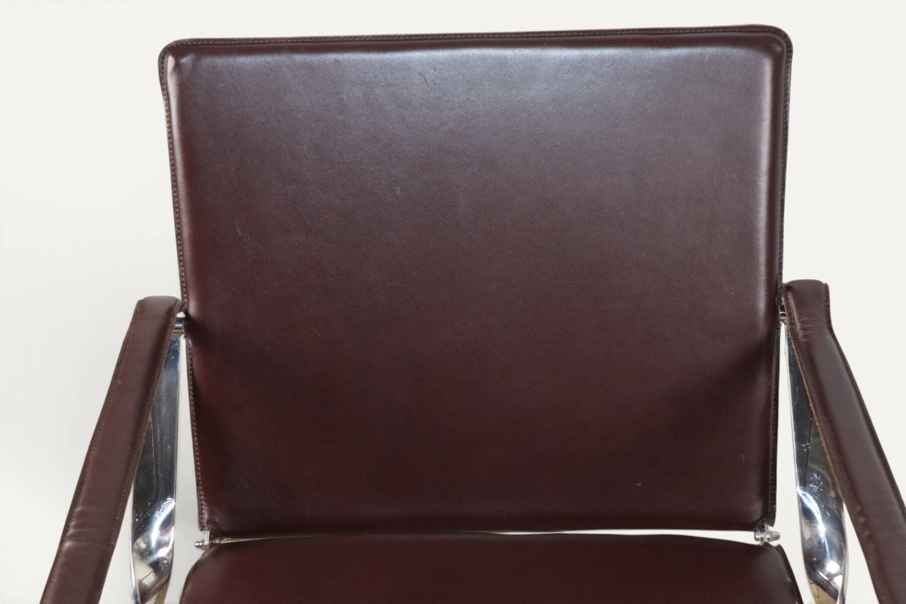 Pair of leather and chrome metal armchairs, Italy - 1970