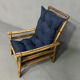 Fauteuil en rotin et son assise neuve extérieure
