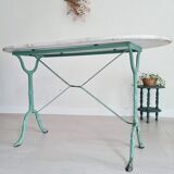White marble bistro table with oval top