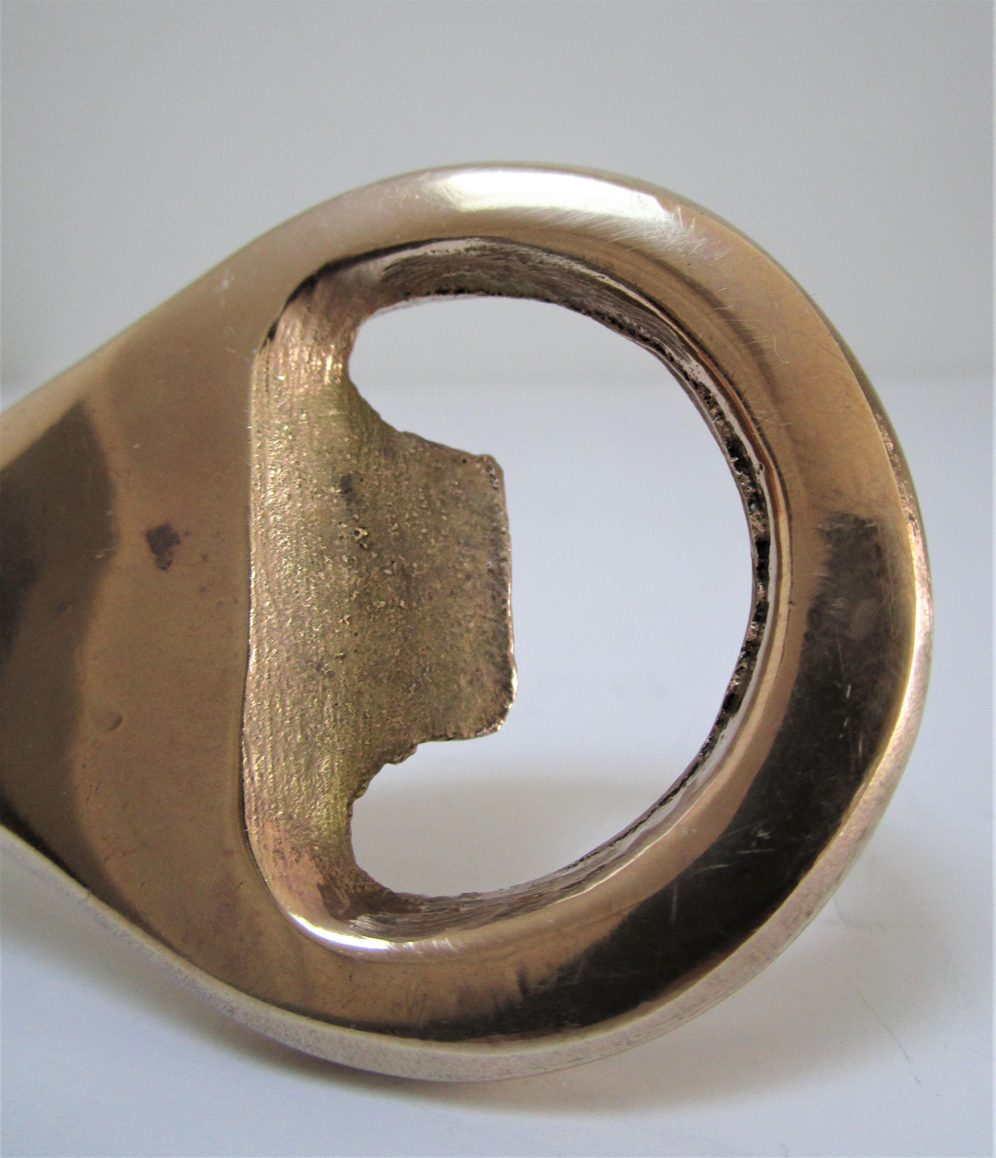 Modernist solid brass bottle opener by Carl Auböck
