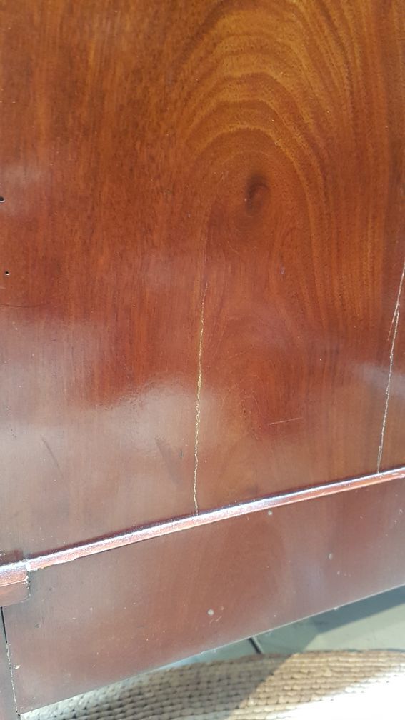 Half-column Empire chest of drawers