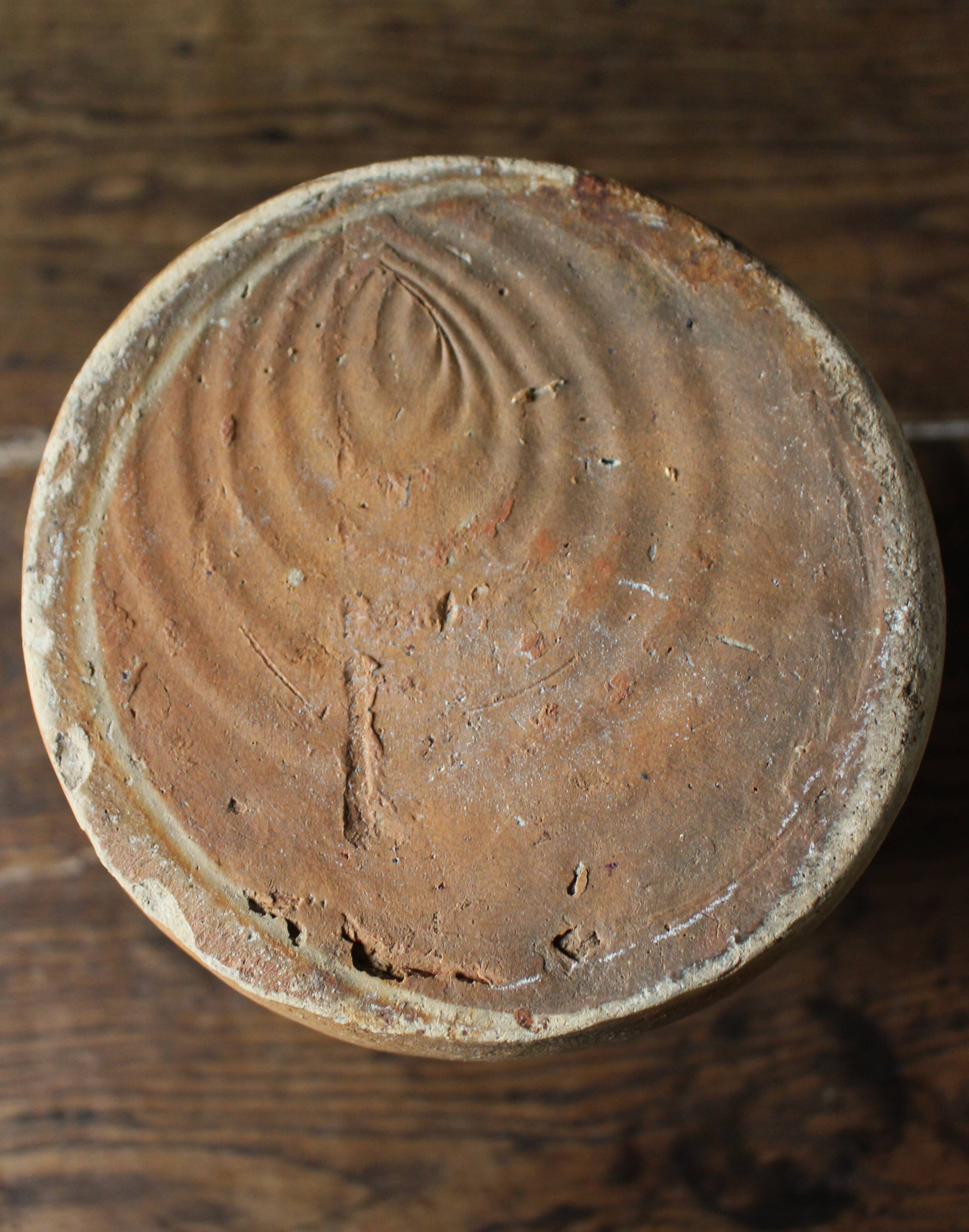 Vintage artisanal terracotta jug