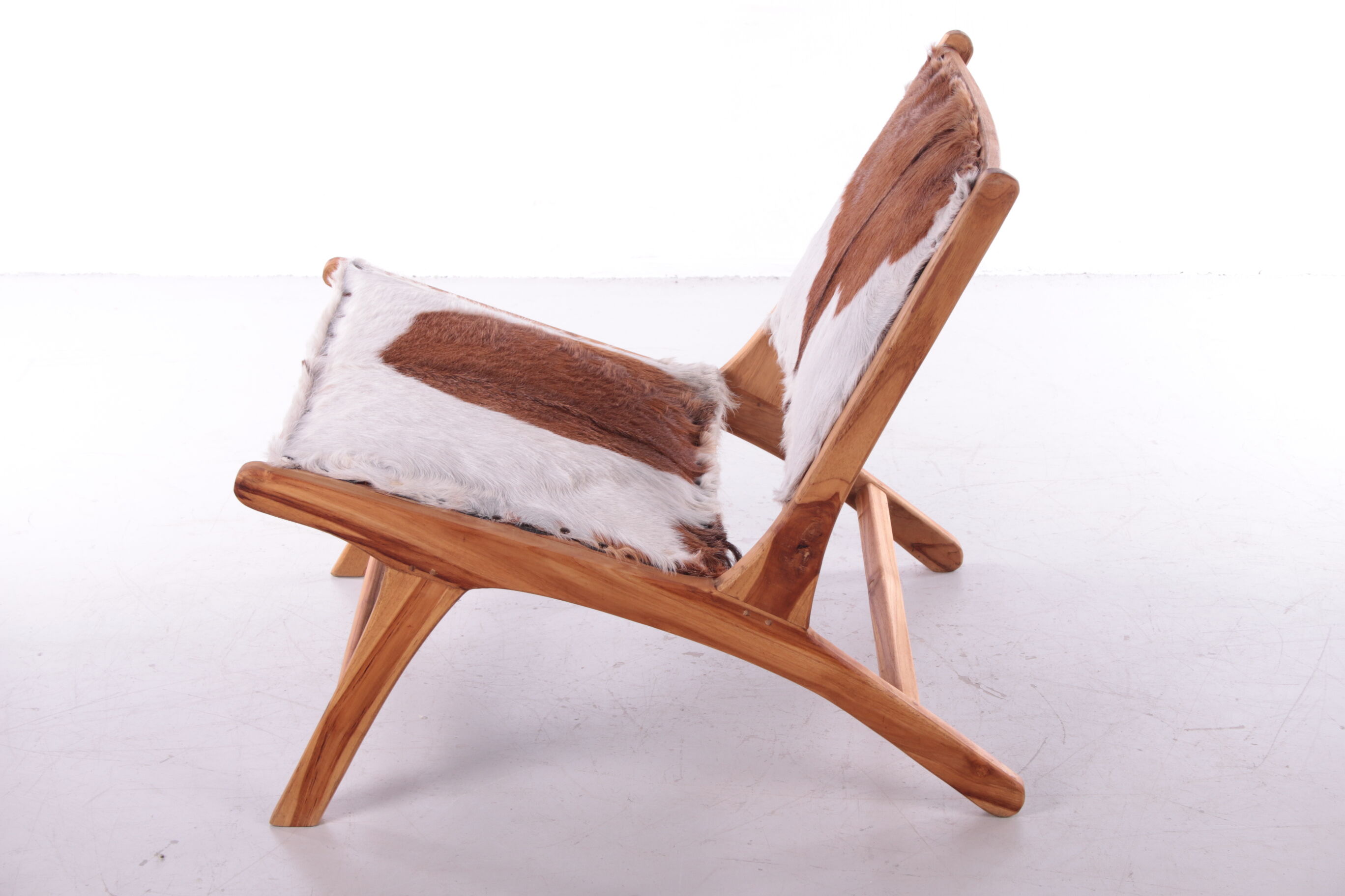Vintage Relax chair upholstered with cowhide, 1970