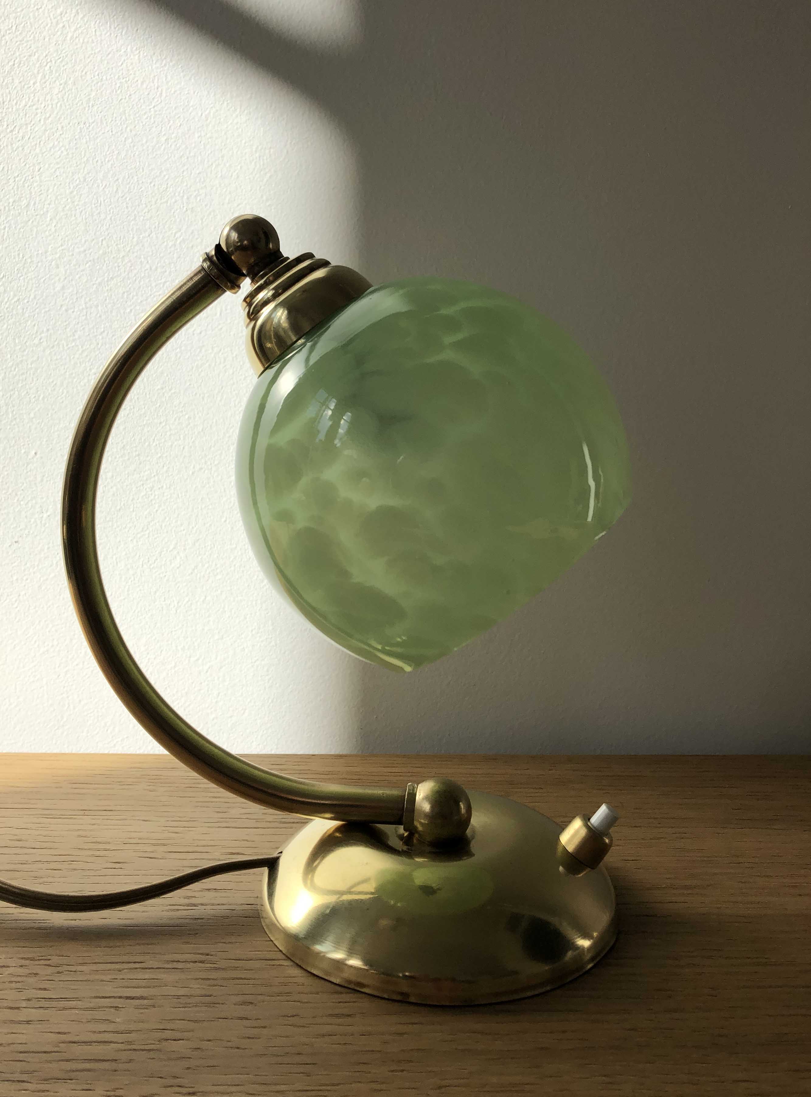 Old articulated bedside lamp
