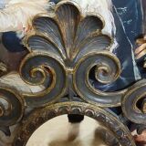 Antique Louis XV style mirror, richly carved with scrollwork, shells, and foliage.