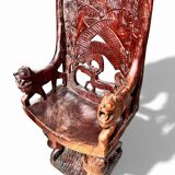 Pair of carved African armchairs