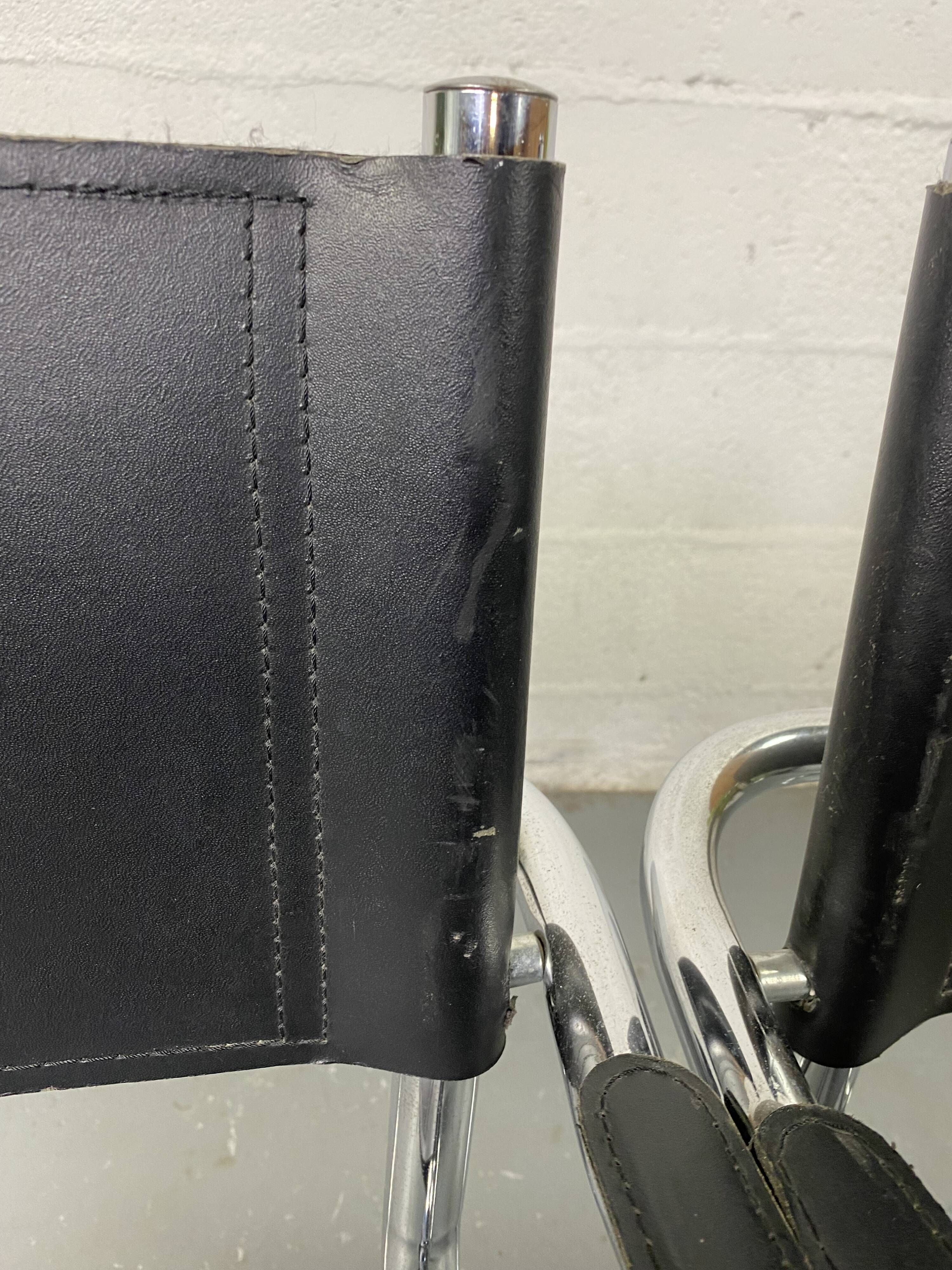 Pair of design armchairs in imitation leather chrome