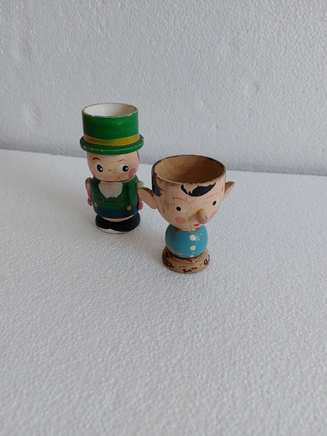 Duo of wooden cockroaches, characters
