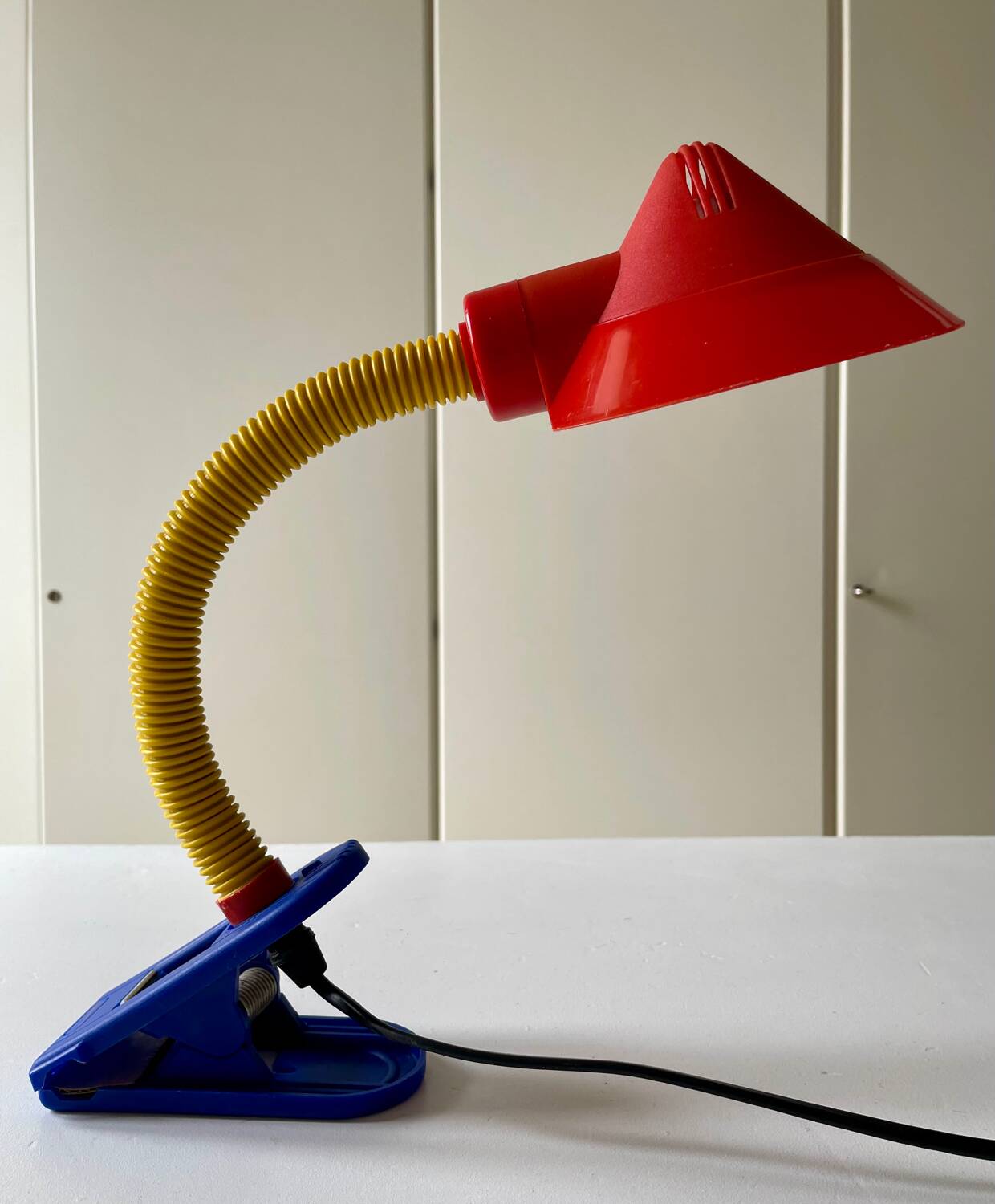 Articulated Memphis style clamp lamp